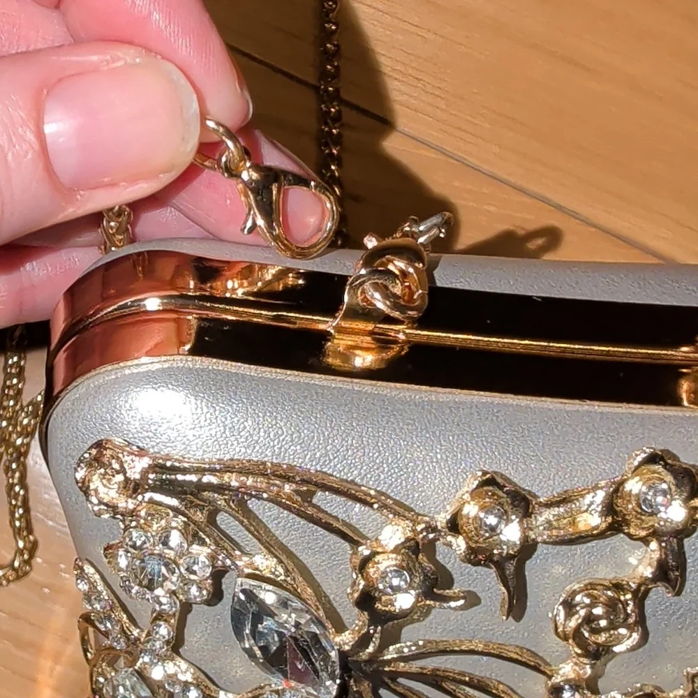 Silver Leather Clutch With Gold And Crystal Floral Embellishments